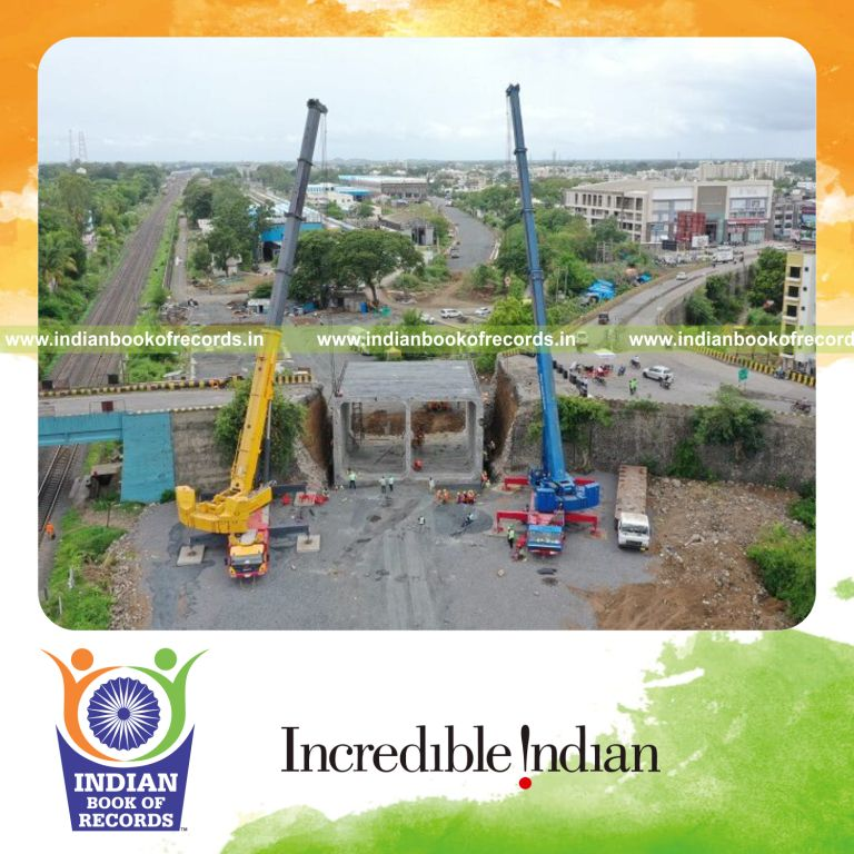 Large PSC segmental twin-cell boxes being installed rapidly near a railway abutment recognized by Indian Book of Records