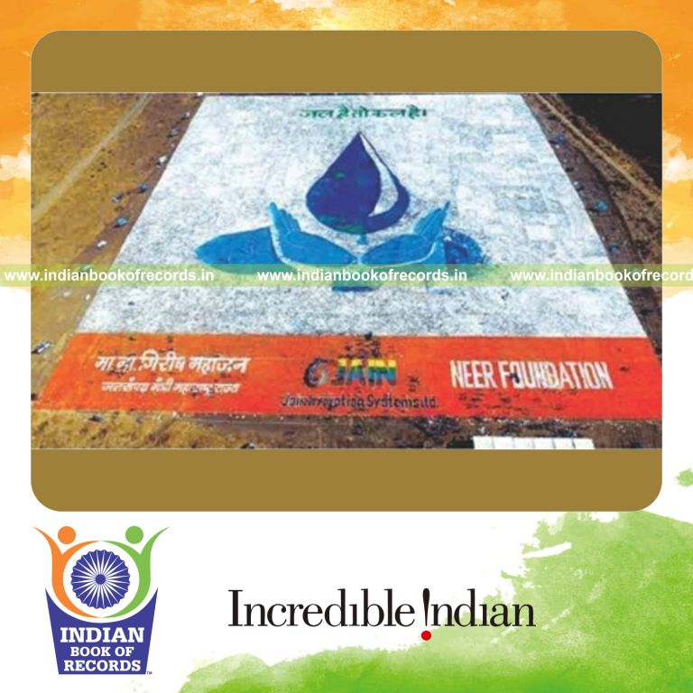 team creating largest rangoli design for Indian Book of Records