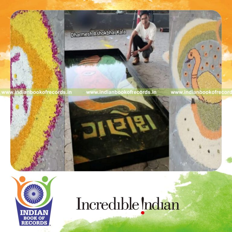 Individual continuously creating rangoli designs over an extended duration recognized by Indian Book of Records