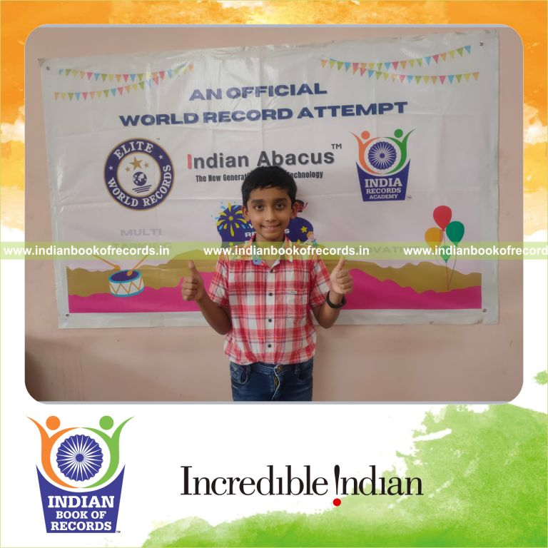 A participant solving numerous addition problems in three rows within three minutes for the Indian Book of Records