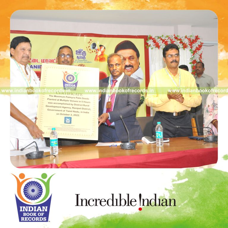 Participants planting numerous palmyra seeds simultaneously at different venues for Indian Book of Records