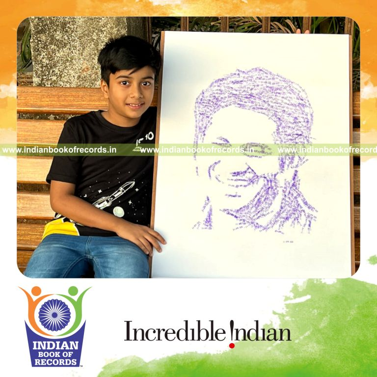Young boy creating a portrait using rubber stamp impressions recognized by Indian Book of Records