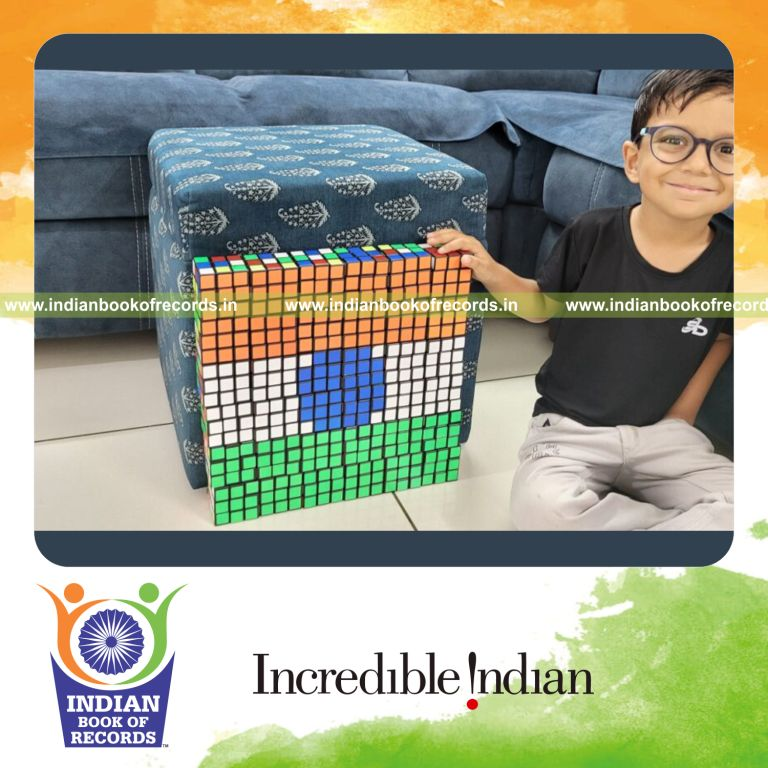 Toddler creating multiple national flags using Rubik’s cubes recognized by Indian Book of Records