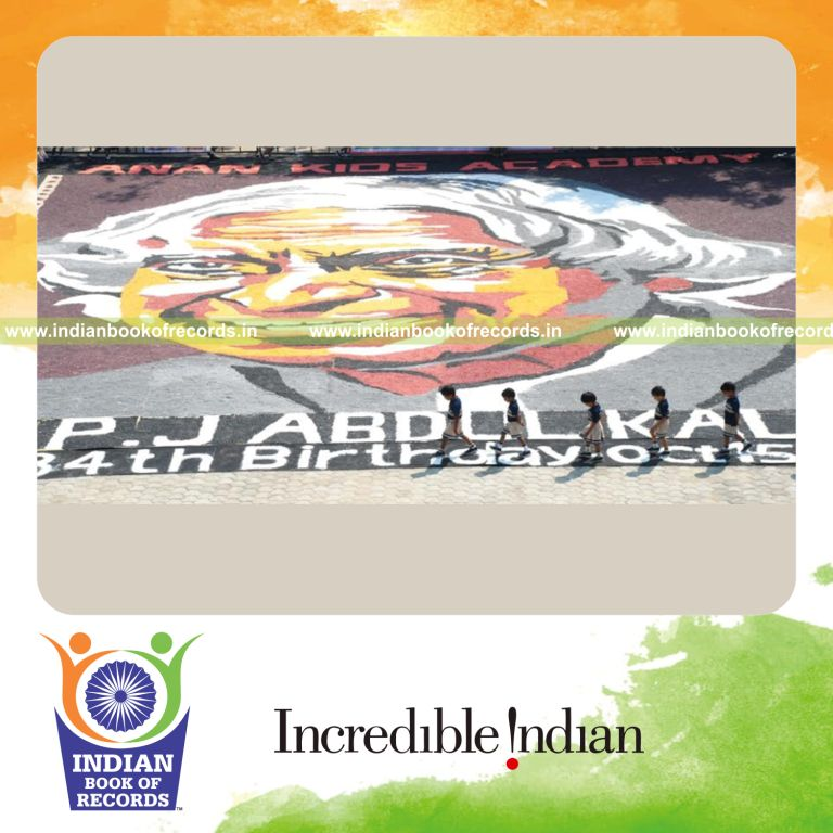 team creating large salt mosaic artwork for Indian Book of Records