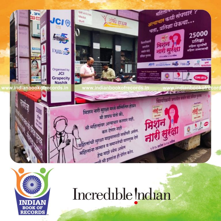 Large book filled with numerous signatures collected for a pledge recognized by Indian Book of Records