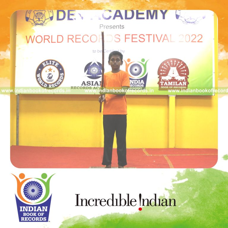 A participant performing Silambam Veliveechu on a nail bed for an extended period for the Indian Book of Records