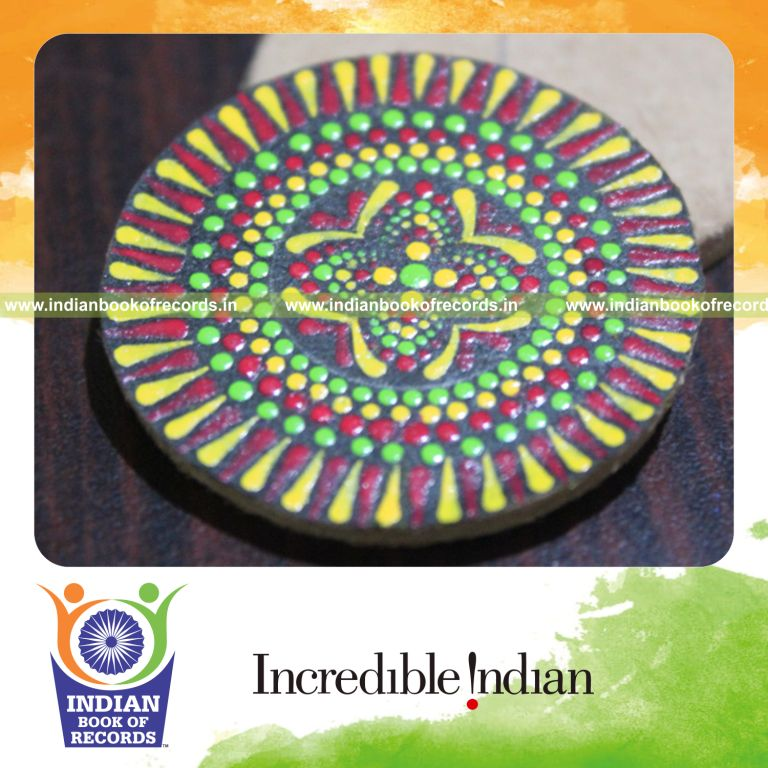 Tiny mandala artwork created using exactly 140 dots with precision recognized by Indian Book of Records