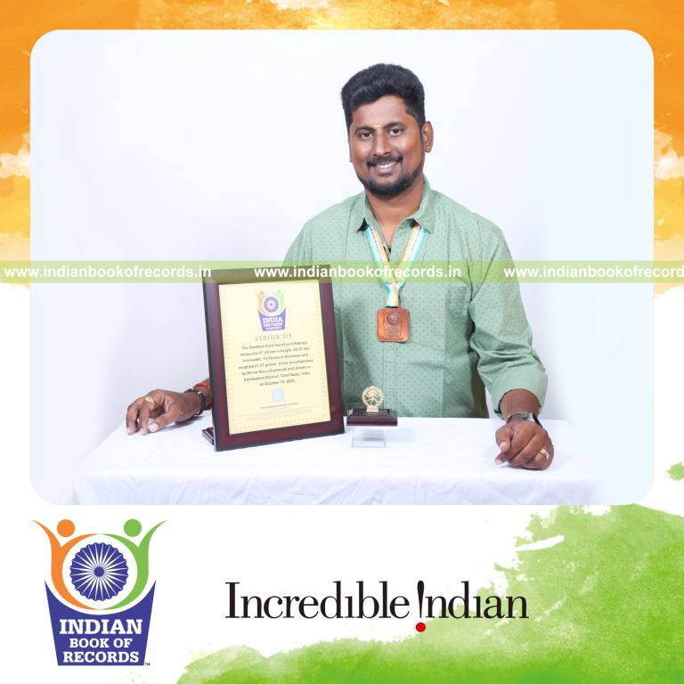 Extremely small gold idol of Lord Natraja showcasing detailed craftsmanship for the Indian Book of Records