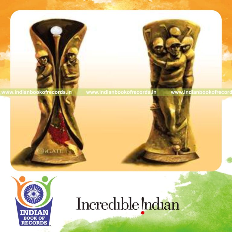male individual creating smallest gold trophy for record in Indian Book of Records