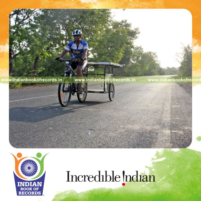 individual completing longest journey on solar powered bicycle for Indian Book of Records