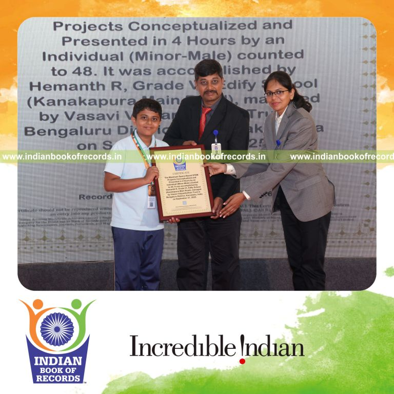 Young boy presenting multiple space-based STEM concepts rapidly recognized by Indian Book of Records
