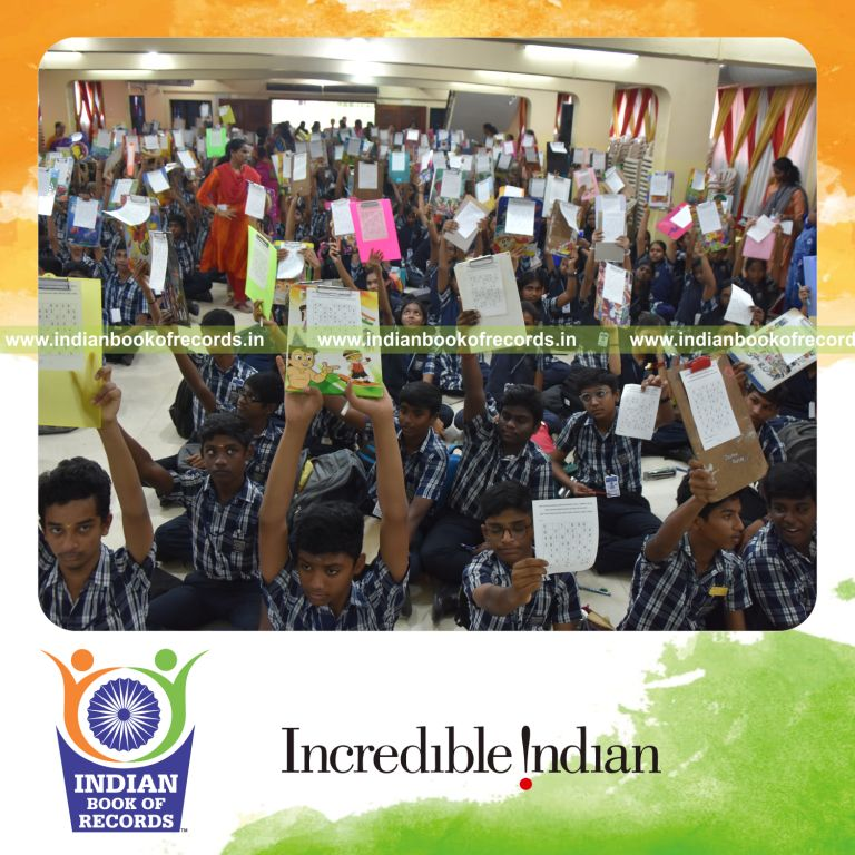 Participants solving Sudoku puzzles together at one location for an Indian Book of Records achievement