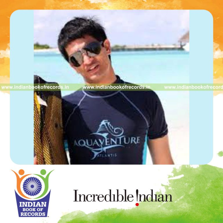 male individual swimming at high altitude for record achievement in Indian Book of Records