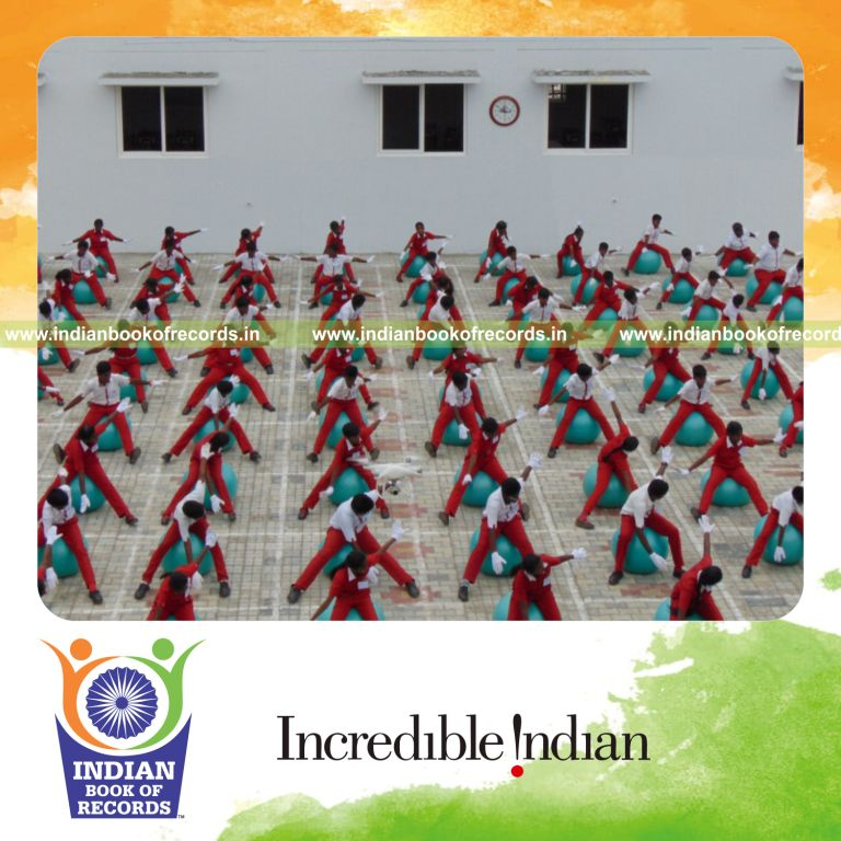 participants exercising on swiss balls simultaneously for Indian Book of Records