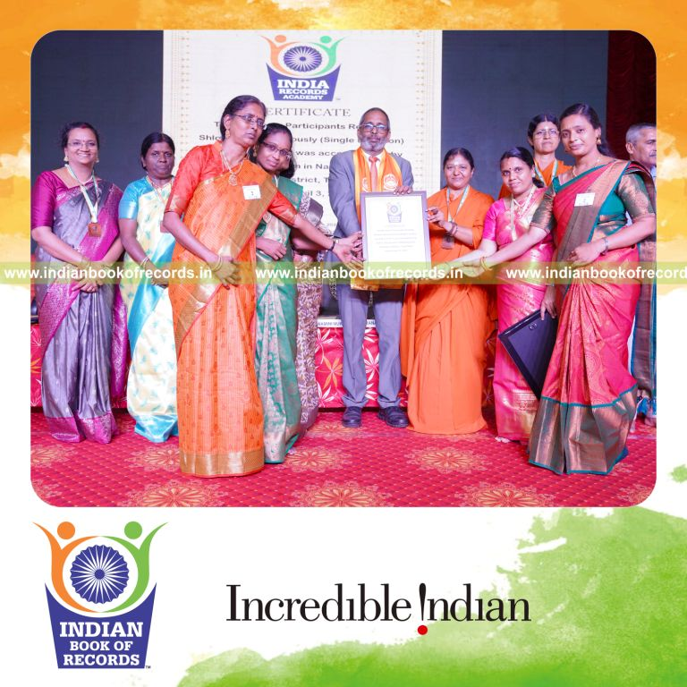 Large group engaged in synchronized shloka recitation at a single location for Indian Book of Records