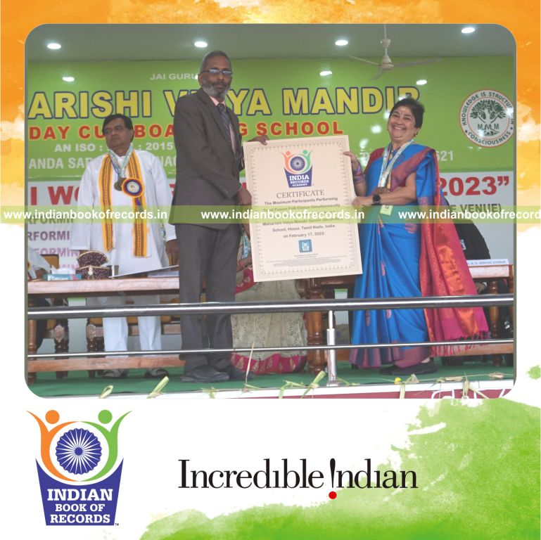 Group performing Tamil fusion folk dance simultaneously in a coordinated event for Indian Book of Records