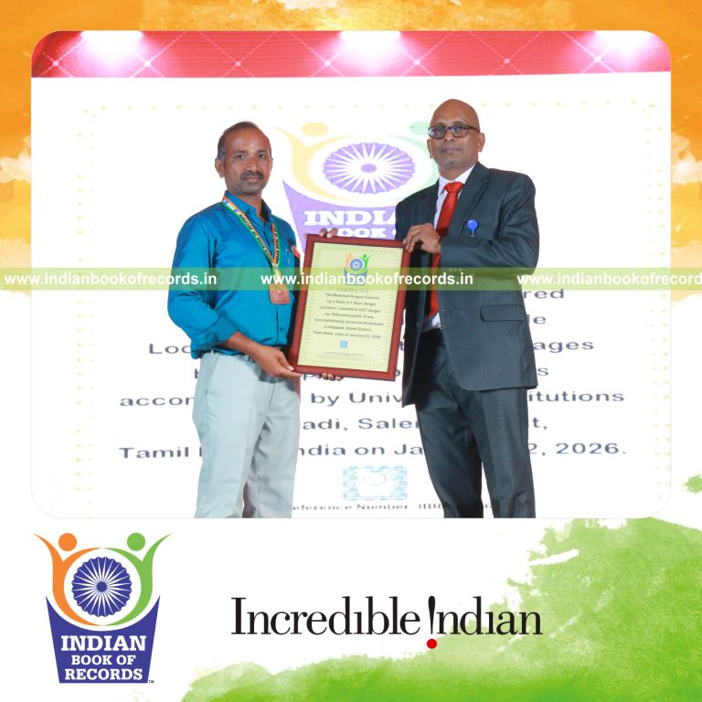 Team members coloring a large number of images within one hour at a single location recognized by Indian Book of Records