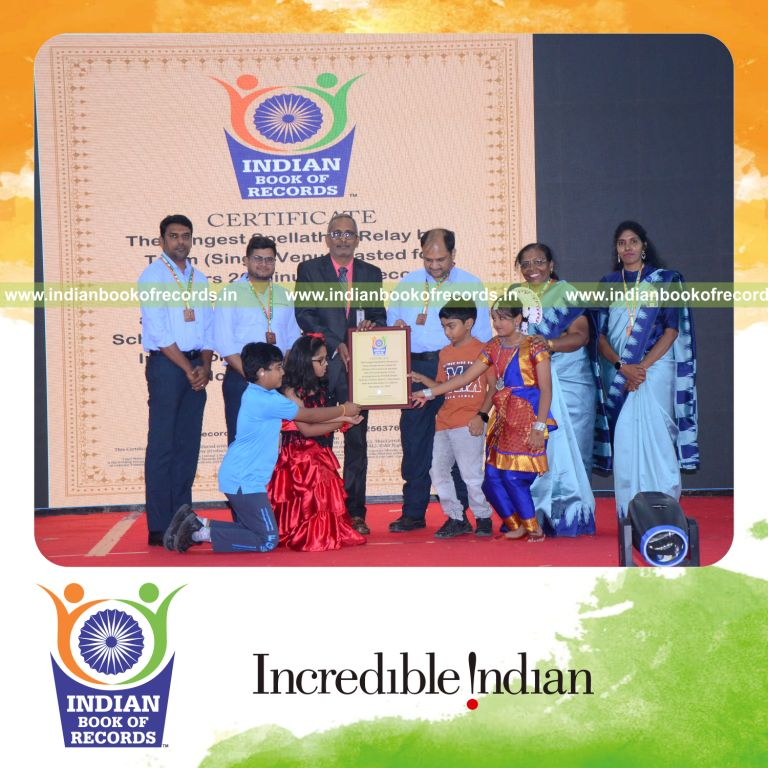 Group participating in a continuous spellathon relay at a single venue recognized by Indian Book of Records