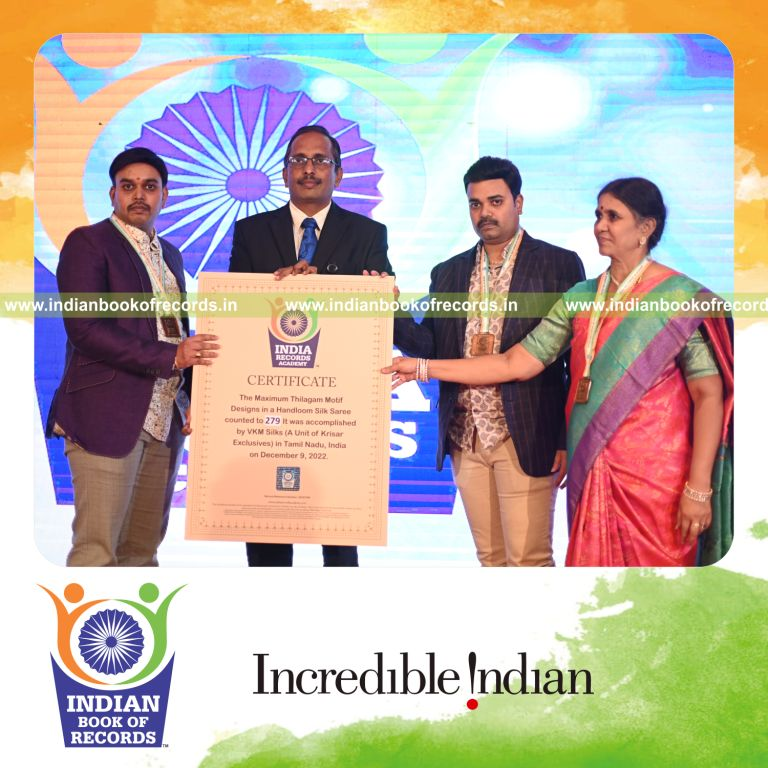 Traditional silk saree featuring detailed thilagam motif designs woven across the fabric for Indian Book of Records