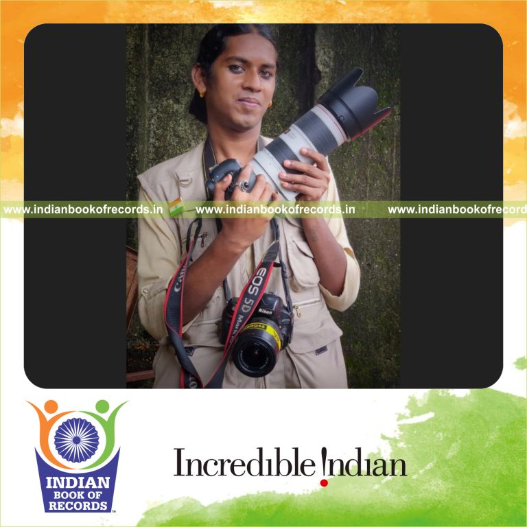 A transgender individual working as a photojournalist recognized by the Indian Book of Records
