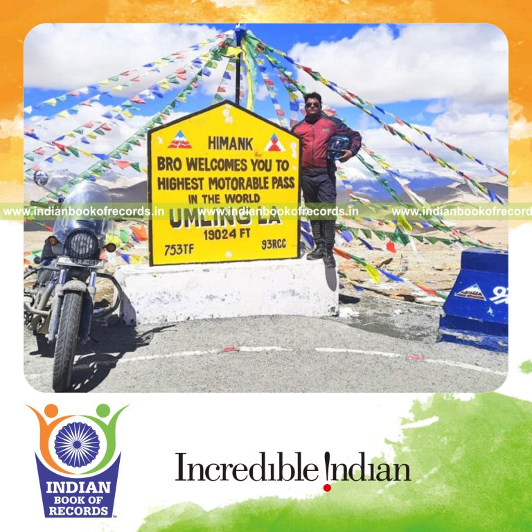 Solo rider reaching Umling La, the highest motorable pass in the world recognized by Indian Book of Records