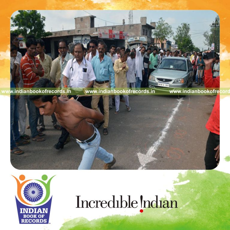 heaviest vehicle pulled using shoulder blades for Indian Book of Records