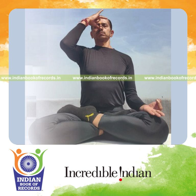 Participants engaged in an extended virtual yoga session conducted online recognized by Indian Book of Records