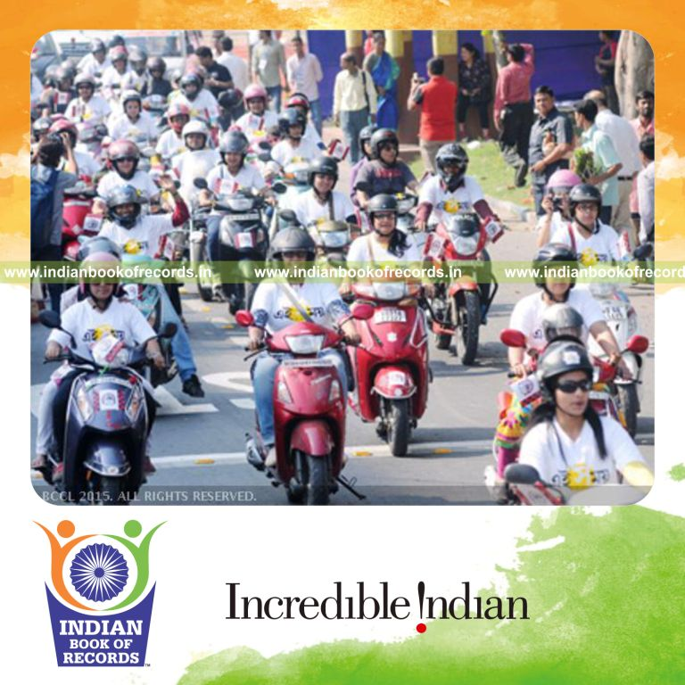women participating in large bike rally for Indian Book of Records