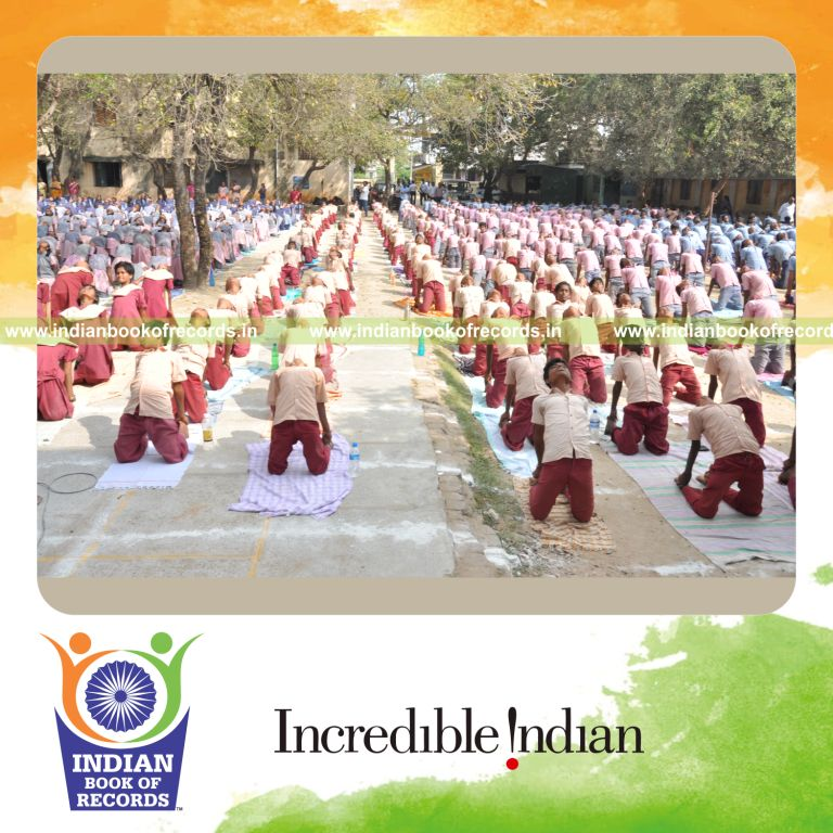 school children participating in large yoga lesson for Indian Book of Records