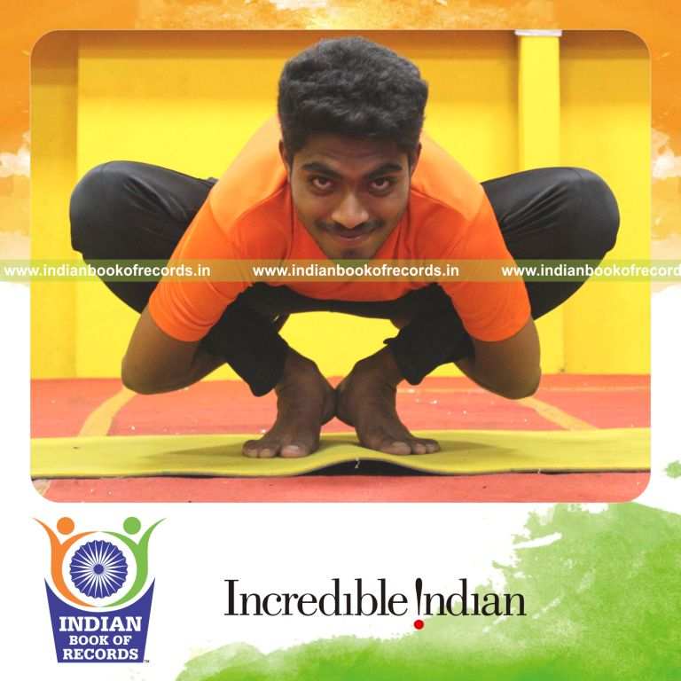 A young participant performing multiple yoga poses within eight minutes for the Indian Book of Records