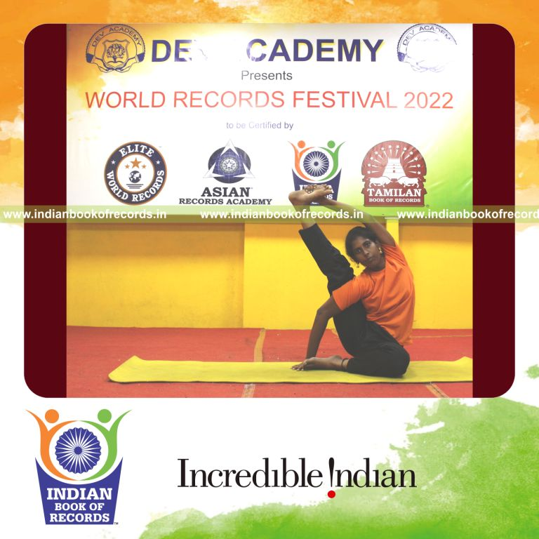 A participant performing numerous yoga poses within twenty minutes for the Indian Book of Records