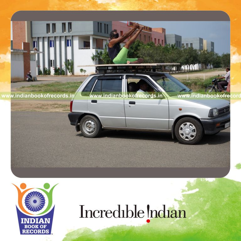 an individual performing yogasanas blindfolded on a moving car within fifteen minutes for a record in Indian Book of Records