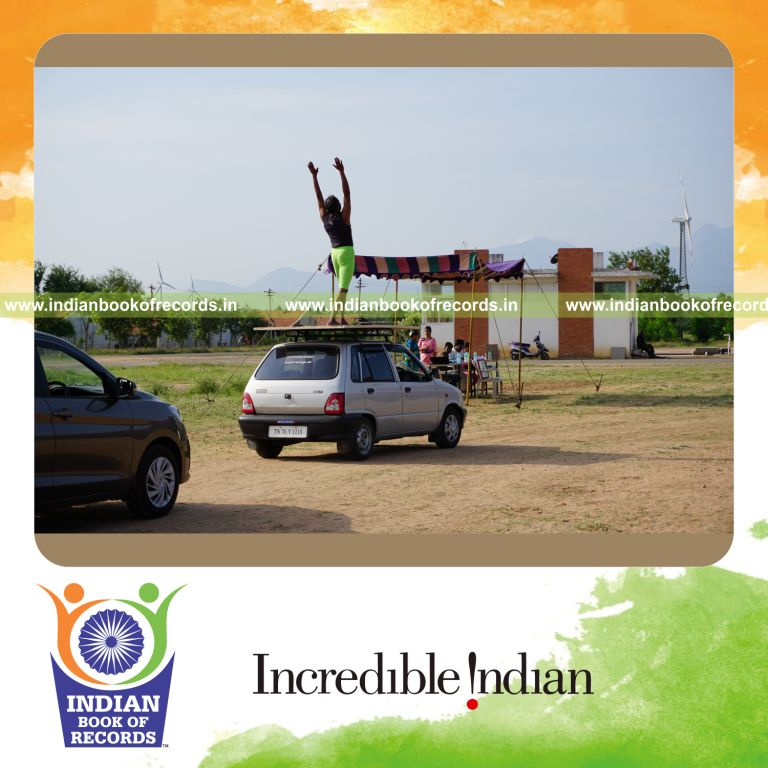 an individual performing multiple yogasanas on a moving car within fifteen minutes for a record in Indian Book of Records
