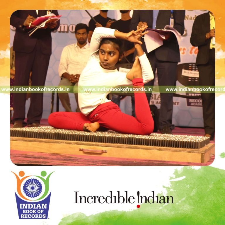 A daring yoga performance carried out on a nail bed within limited time for Indian Book of Records