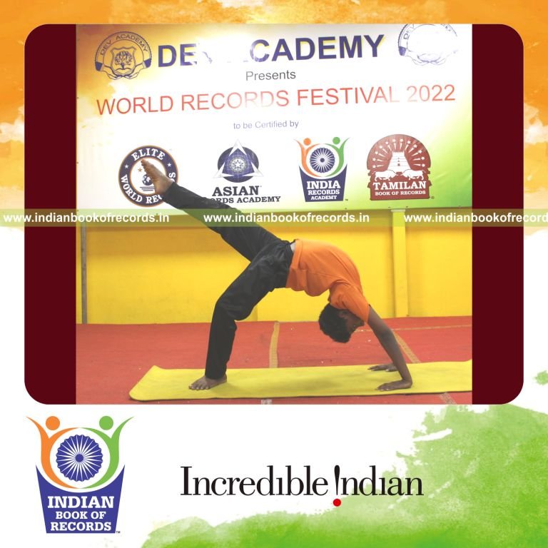 A young participant performing many yogasanas within thirty minutes for the Indian Book of Records