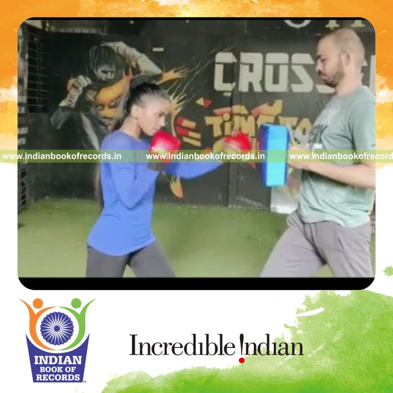 Young girl performing rapid boxing punches in a high-speed display recognized by Indian Book of Records