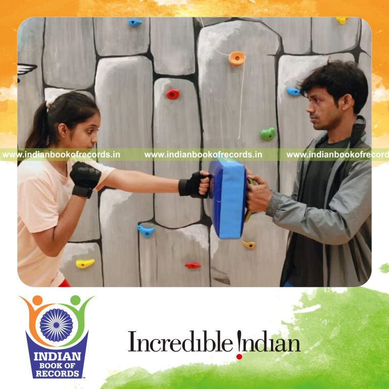 Young girl delivering rapid boxing punches within one minute in a high-speed display recognized by Indian Book of Records