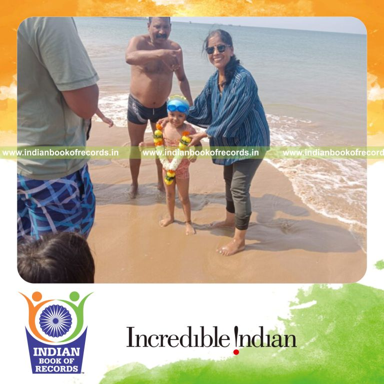 Toddler girl swimming under the sea during low tide recognized by Indian Book of Records