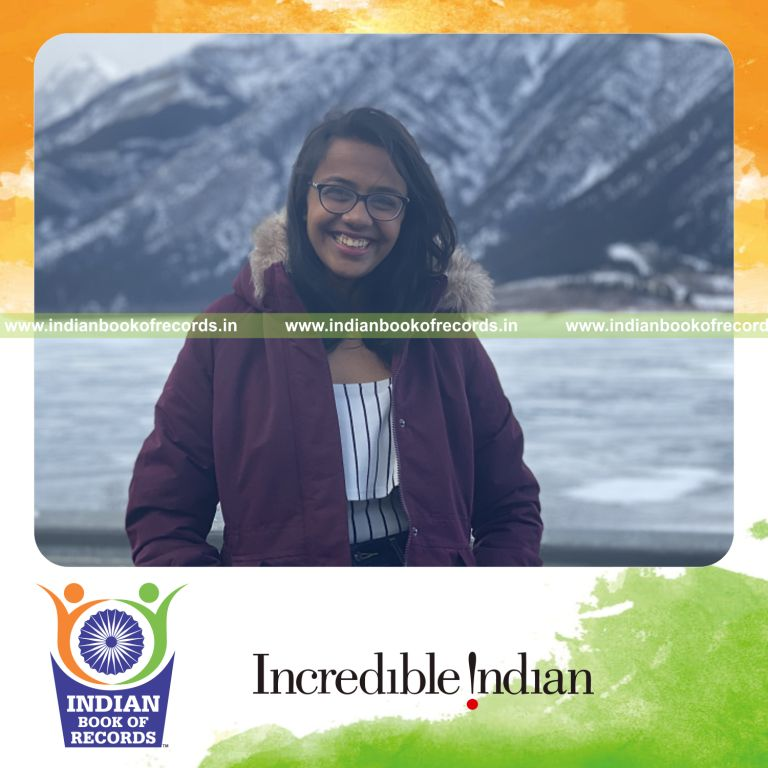a young individual achieving a phd in metaphysical humanistic science at an early age for a record in Indian Book of Records
